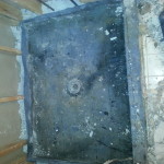 After we removed the old tile we discovered mold on top of the shower pan liner
